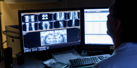 Radiologist reviewing images