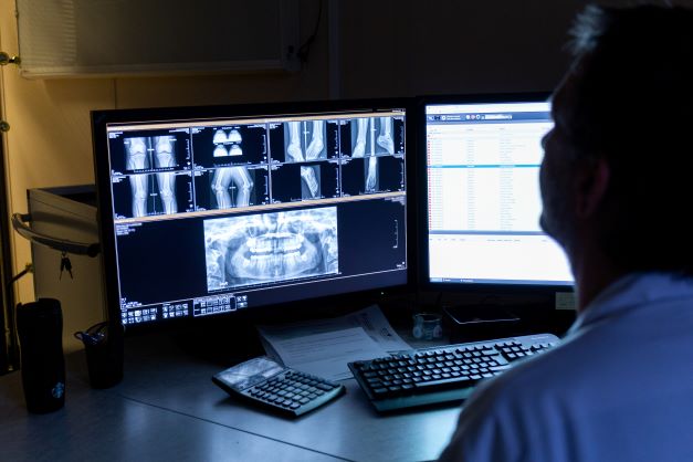 Radiologist reviewing images